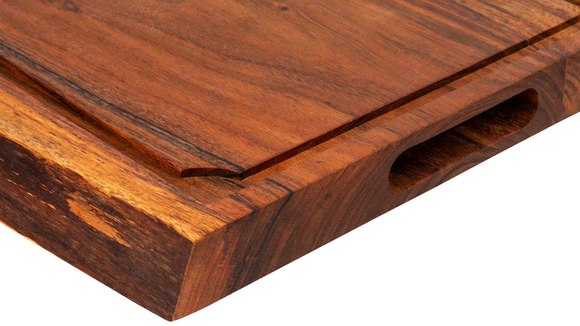 De zijplank gezien vanaf de zijkant gezien, met het ingevreesde handvat duidelijk in beeld.