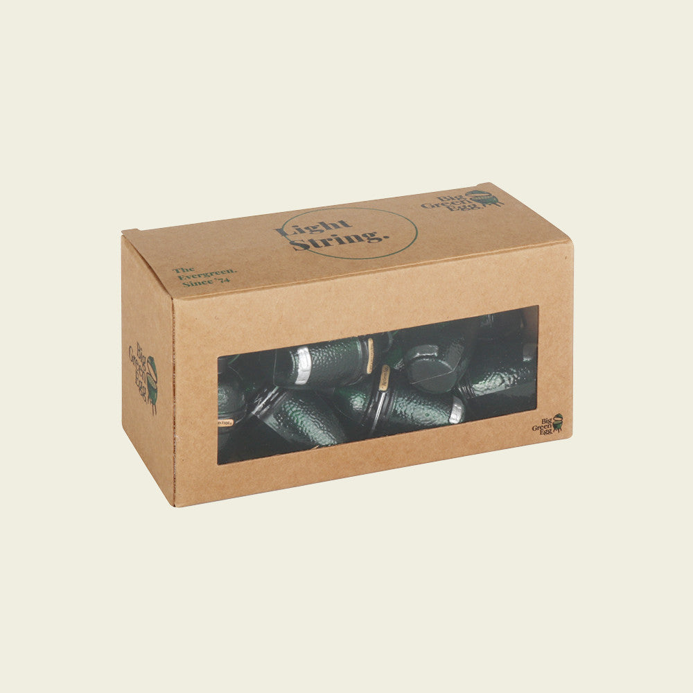De Big Green Egg LED lichtjes in een bruine verpakking  voorzien van een doorzichtig venster. 