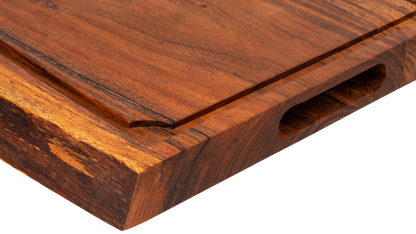 De zijplank gezien vanaf de zijkant gezien, met het ingevreesde handvat duidelijk in beeld.