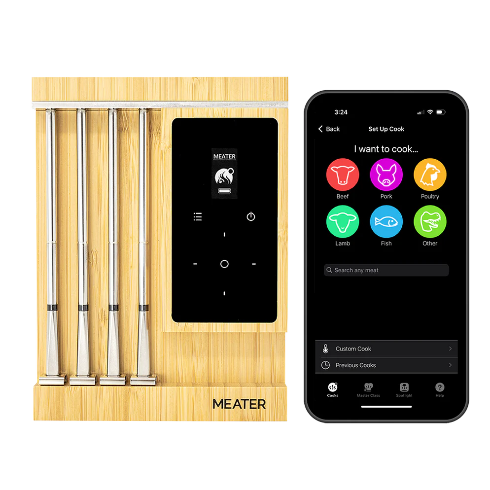 De bamboe oplader met 4 probes en display. Rechts van de oplader ligt een mobiele telefoon met de Meater kookapp. 